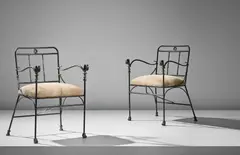Diego Giacometti, Pair of 'Têtes de Lionnes' armchairs, second version, conceived 1979, executed 1979-1985, Patinated bronze, wrought iron, hide