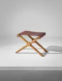 'Rodo' folding stool by Paul Rodocanachi for Jean-Michel Frank, circa 1936, Oak, leather, brass nailheads, offered Sep 2017