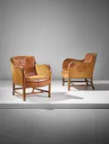 Pair of 'Mix' easy armchairs, model no. 4396 by Kaare Klint and Edvard Kindt-Larsen, designed 1930, executed 1932-1933, Cuban mahogany, Niger leather, brass nailheads, offered Sep 2017