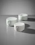 Set of three pots by Edmund de Waal, circa 2004, Porcelain, celadon glaze, offered Sep 2017