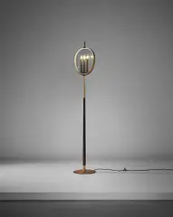 Standard lamp, model no. 1569 by Max Ingrand, circa 1955, Tubular brass, brass, nickel-plated brass, painted brass, painted wood, clear glass, sold Sep 2017