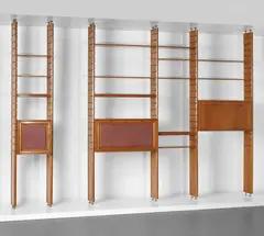 Modular bookcase by Studio B.B.P.R., circa 1960, Walnut, walnut-veneered wood, leather bound wood, brass, sold Sep 2017