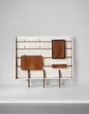 Rare bookcase with integrated drinks cabinet by Gio Ponti, circa 1945, Walnut, walnut-veneered wood, painted wood, glass, brass, sold Sep 2017