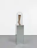 Josephine Meckseper, Untitled, 2010, mannequin leg in hosiery, glass dome on artist's plinth