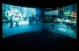 Mariko Mori, Link, 1995, 4 channel DVD installation comprised of 4 DVDs, 4 video projectors, 4 playback units, 5:1 surround sound, Plexiglas circle and metal ring structure