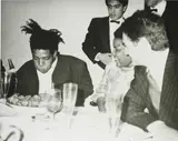 Jean-Michel Basquiat, Basquiat's Mother and friends by Andy Warhol, 1984, silver gelatin print, sold Dec 2016