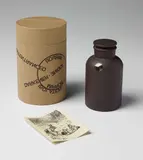 Joseph Beuys, Mirror Piece, from Mirrors of the Mind, 1975, Lacquered flask, with mirror-finished interior, containing iodine crystals, with accompanying card How to explain the iodine bottle to the Hares , and cylindrical cardboard container,