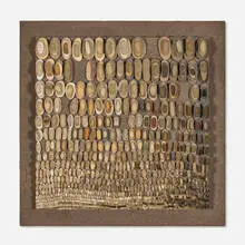 Mary Bauermeister, St. Pierre, 1964, stones on particle board coated with sand mounted on a larger particle board coated with sand