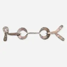Untitled (Cape Clasp) by Alexander Calder, c. 1937, silver wire, sold Nov 2025