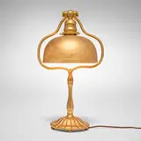 Tiffany Studios, Desk lamp, c. 1910, acid-etched and gilt bronze