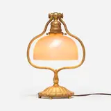 Damascene desk lamp by Tiffany Studios, c. 1910, acid-etched and gilt bronze, hand-blown Favrile glass, sold Nov 2025