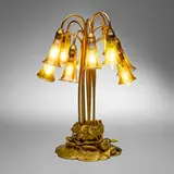 Ten-light Lily table lamp by Tiffany Studios, c. 1910, gilt bronze, hand-blown Favrile glass, sold Nov 2025