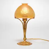 Boudoir lamp base with leaves by Tiffany Studios, c. 1910, gilt bronze, sold Nov 2025