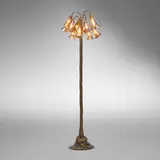 Twelve-light Lily floor lamp by Tiffany Studios, c. 1910, acid-etched and gilt bronze, hand-blown Favrile glass, sold Nov 2025