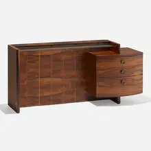 No. 3770 Group vanity by Gilbert Rohde, c. 1940, rosewood, brass, glass, sold Sep 2024