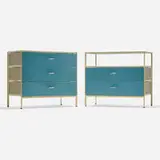 Steelframe cabinets, set of two by George Nelson & Associates, laminate, lacquered steel, painted wood, chrome-plated metal, glass, sold Sep 2024
