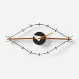 Eye wall clock, model 2238 by George Nelson & Associates, 1957, enameled steel, brass, enameled aluminum, walnut, lacquered wood, sold Sep 2024