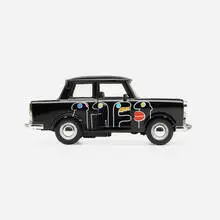 Trabant model car by Thierry Noir, c. 1995, enameled pot-metal, plastic, rubber, sold Aug 2024