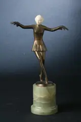 Dancer by Josef Lorenzl, Bronze and ivory, on green onyx base; signed Renzl, sold Sep 2011