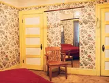 Katharina Bosse, Room with flower tapestry, 1999, C-Print