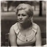 Woman with a locket in Washington Square Park, N.Y.C. by Diane Arbus, 1965, Gelatin silver print, printed later by Neil Selkirk, offered May 2016