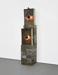 Christian Boltanski, Reliquaire, 1990, Mixed media installation comprised of two gelatin silver prints, two electric lamps and cables, two steel boxes with wire mesh and thirty-six tin boxes containing fabric