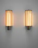 Pair of wall lights by Poul Henningsen, circa 1934, Nickel-plated tubular brass, tubular aluminium, painted aluminium, coloured glass, Bakelite, offered Apr 2016