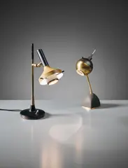 Two adjustable table lamps by Oscar Torlasco, 1950s, Painted brass, painted tubular brass, painted aluminium, brass, sold Apr 2016