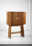 Paolo Buffa, Illuminated drinks cabinet, circa 1943, Oak, oak-veneered wood, brass, tubular brass, mirrored glass, opaque glass