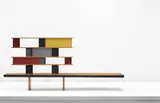 'Tunisie' bookcase, designed for the student rooms of La Maison de la Tunisie, Cité Internationale Universitaire de Paris by Charlotte Perriand, 1952, Oak, pine, mahogany, painted diamond-point aluminium, painted metal, sold Apr 2016