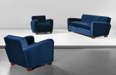 Jean Royere, Sofa and pair of armchairs, 1950s, Walnut-veneered wood, fabric