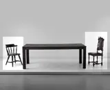 Maarten Baas, Two unique chairs, from the 'Where There's Smoke' series, 2007, Charred pre-existing chairs, epoxy resin, brass nail heads, leather
