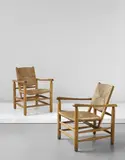 Charlotte Perriand, Pair of armchairs, model no. 21, from 'L’Equipement de la Maison' series, Grenoble