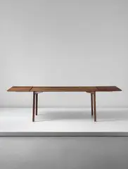 'Grand Prix' extendable dining table, model no. FH 4605 by Arne Jacobsen, circa 1959, Brazilian rosewood-veneered wood, Brazilian rosewood, mahogany, brass, offered Sep 2016