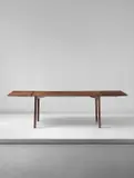 Arne Jacobsen, 'Grand Prix' extendable dining table, model no. FH 4605, circa 1959, Brazilian rosewood-veneered wood, Brazilian rosewood, mahogany, brass