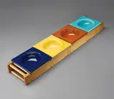 Rare centrepiece with four dishes, model no. 433 by Ettore Sottsass, circa 1959, Glazed earthenware, stained oak, offered Sep 2016