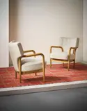 Vilhelm Lauritzen, Pair of armchairs, designed for the Radiohuset (National Broadcasting House), Copenhagen, circa 1945, Beech, fabric