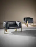 Esko Pajamies, Pair of 'Polar' lounge chairs, circa 1965, Bronze, leather-covered metal, leather