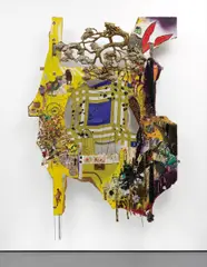 Elliott Hundley, O Dika, 2007, wood, sound board, Styrofoam, plastic, wax, paper, string, glitter, wire, silk, acrylic paint, canvas, tin, pins, feathers, animal claws, metal brackets, wheel
