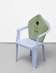Ry Rocklen, Guru, 2007, plastic chair, plaster, found objects, pebbles