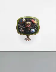 Self-Portrait by Nam June Paik, 1989, 1950's Philco Predicta television cabinet containing bronze mask of the artist, video tape, antique TV cubes and circuit, sold Jan 2015