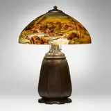 Handel, Teroma table lamp with mountain stream landscape, c. 1919, reverse-painted Chipped Ice glass, patinated metal
