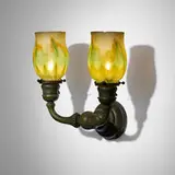 Two-arm sconce with pulled-feather shades by Tiffany Studios, c. 1910, hand-blown Favrile glass, patinated bronze, sold Nov 2025