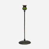 Blown-out candlestick by Tiffany Studios, c. 1910, patinated bronze, hand-blown glass, sold Nov 2025