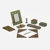 Pine Needle nine-piece desk set by Tiffany Studios, c. 1910, patinated bronze, Favrile glass, glass, sold Nov 2025