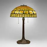 Turtleback table lamp by Tiffany Studios, c. 1910, leaded glass, Favrile glass, patinated bronze, sold Nov 2025