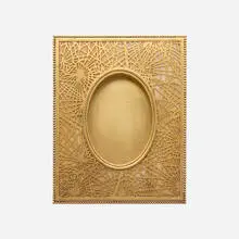 Pine Needle picture frame by Tiffany Studios, c. 1910, gilt bronze, Favrile glass, sold Nov 2025