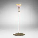 Queen Anne's lace candlestick with tendril cup shade by Tiffany Studios, c. 1905, patinated bronze, Favrile glass, sold Nov 2025