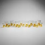 Collection of sixteen Marienthal glasses by René Lalique, c. 1927, molded amber glass, sold Nov 2025
