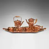 Tiffany Studios, Seven-piece coffee and tea service, c. 1905, copper-plated brass, brass, wood